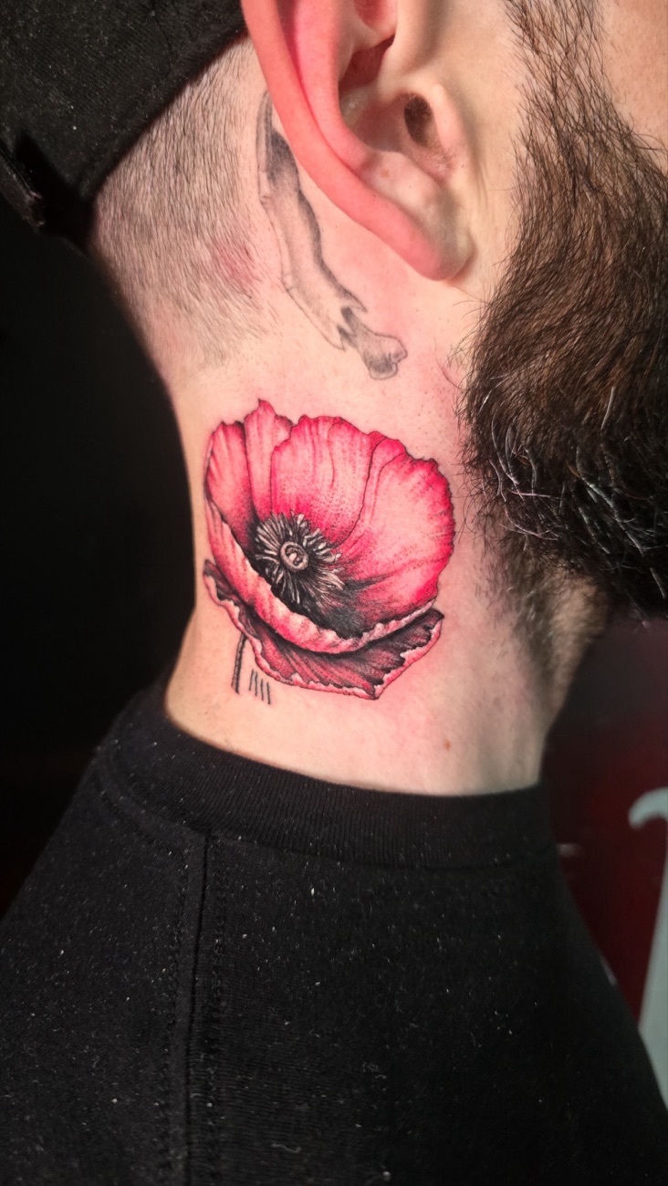 Colour poppy tattoo with fine dotwork shading on the neck, by Rocky Ink & Piercing in Whitechapel